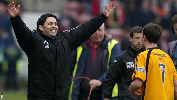 Paul Hartley celebrates