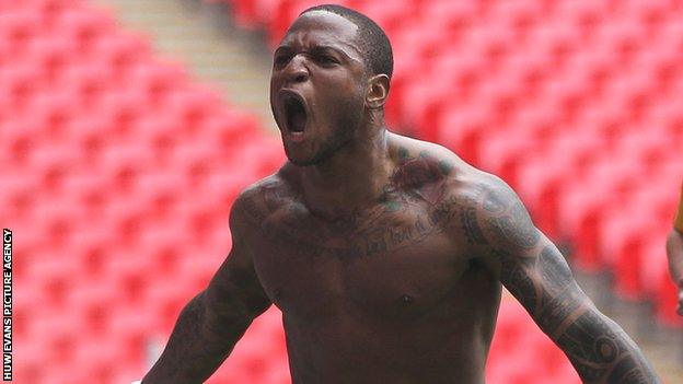 Aaron O'Connor celebrates scoring Newport's second goal in the Conference play-off final against Wrexham