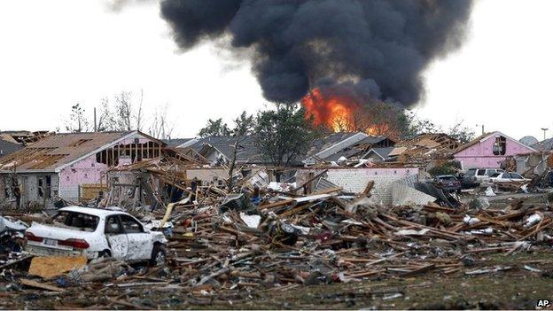 A fire burns in the Plaza Towers Elementary School in Moore