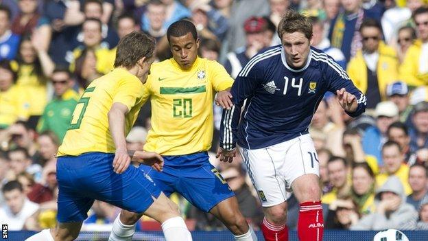 Kris Commons in action for Scotland