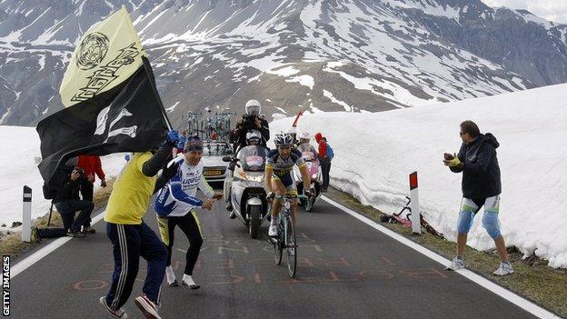 Riders race towards the Stelvio Pass in 2012