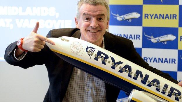 Ryanair chief executive Michael O'Leary with a model aircraft