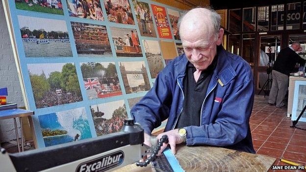 David Evans cutting jigsaw pieces