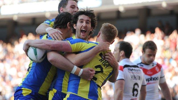 Warrington celebrate Chris Riley's opening try