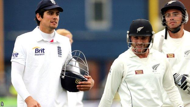 England captain Alastair Cook (left) with counterpart Brendon McCullum