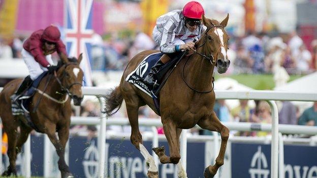 Talent (right) wins the Oaks at Epsom