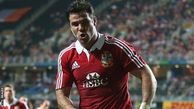 Mike Phillips celebrates scoring in Hong Kong