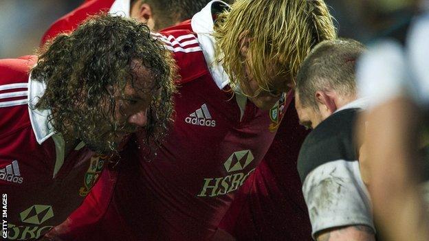 Sweat pours from the hair of Lions prop Adam Jones and hooker Richard Hibbard