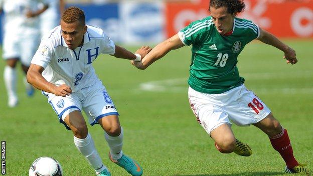 Arnold Peralta (left) in action for Honduras