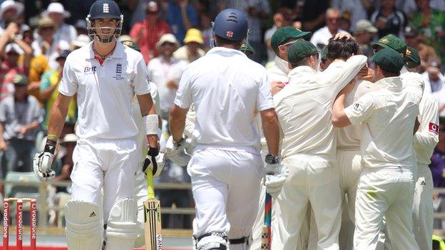 Kevin Pietersen waits for a decision as Australia celebrate his wicket