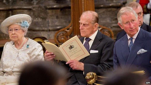 Left to right: the Queen, the Duke of Edinburgh, and the Prince of Wales