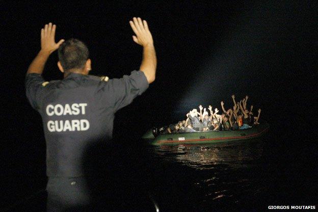 Coastguard signals to refugee boat