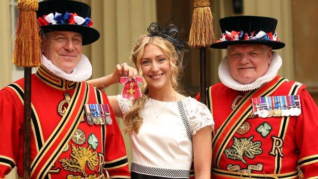 British Olympic cyclist Laura Trott with members of the Yeoman of the Guard