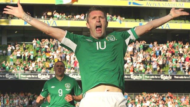 Robbie Keane celebrates his early goal against the Faroe Islands