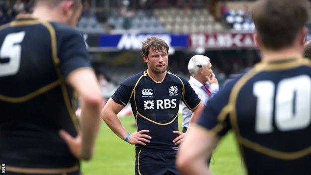 Scotland's Peter Horne looks dejected after defeat by Samoa