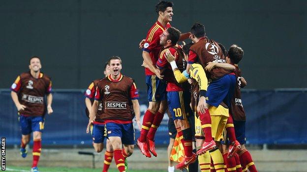 Spain's players celebrate after taking the lead against Germany at the European Under-21 Championship