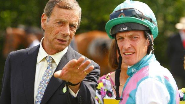 Sir Henry Cecil with jockey Richard Hughes