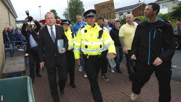 Fans protest to Kilmarnock chairman Michael Johnston