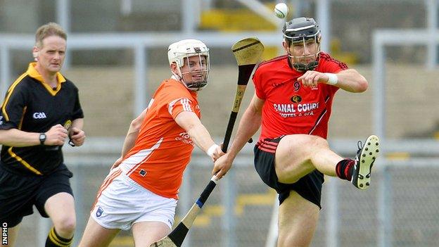 Armagh's Kevin McGarry challenges Declan Coulter in the quarter-final