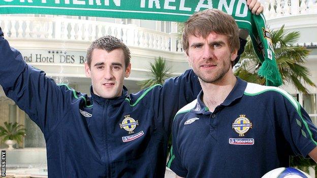 Former Derry City players Niall McGinn and Paddy McCourt