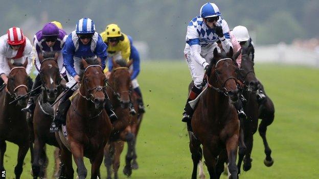 Al Kazeem (right)