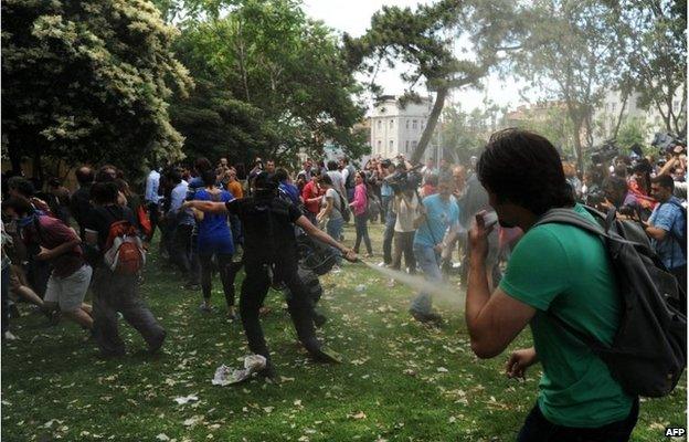 A police fires tear gas in Istanbul, Turkey (38 May 2013)