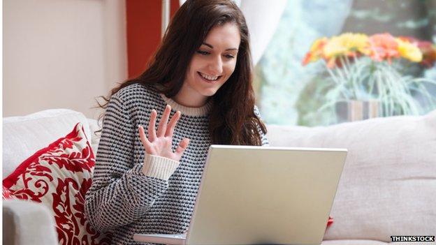 Woman using webcam