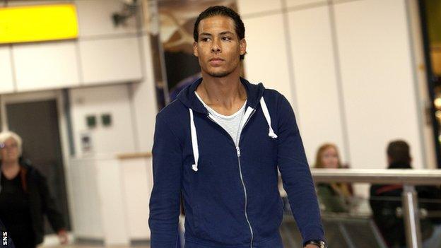 Virgil van Dijk arrives at Glasgow Airport