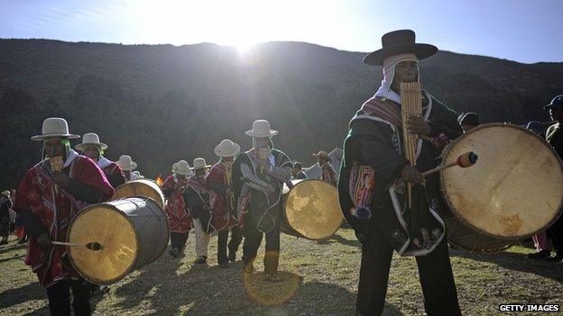 Aymara natives arrive to Khona bay for summer solstice celebrations on Isla del Sol, Lake Titicaca, Bolivia