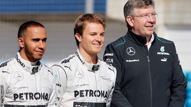 Lewis Hamilton (left), Nico Rosberg (centre) and Ross Brawn