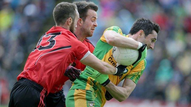 Donegal's Rory Kavanagh with Conor Laverty and Mark Poland of Down