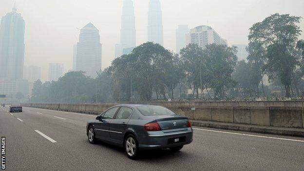 Petronas Towers in Kuala Lumpur shrouded in haze (23 June 2013)