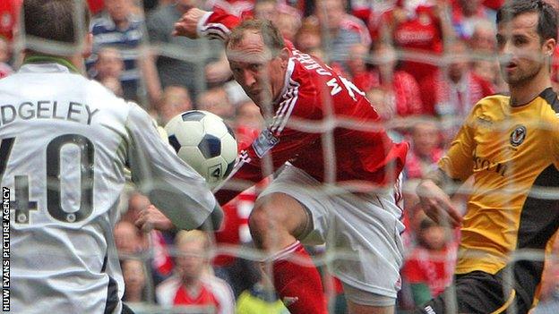 Andy Morrell takes a shot at goal in the Conference play-off final against Newport County at Wembley