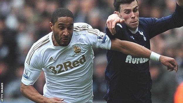 Swansea's Ashley Williams takes on Gareth Bale of Tottenham Hotspur