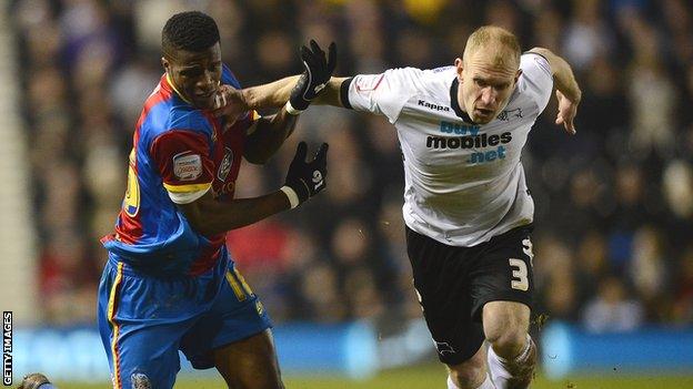 Gareth Roberts tackles Wilfried Zaha