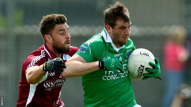 Westmeath's Paul Sharry challenges Fermanagh's Sean Quigley