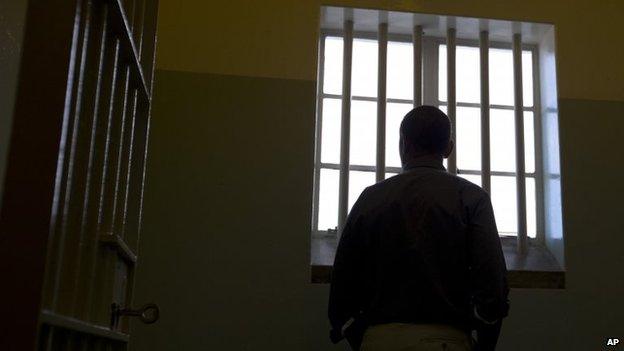 President Obama in Nelson Mandela's former cell on Robben Island, 20 June 2013