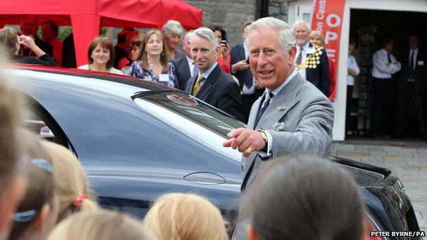 Prince Charles arrives in Llandovery for his first visit of the day.