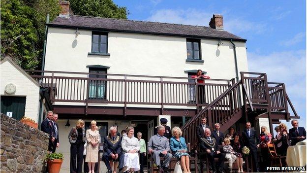 Prince Charles and the Duchess of Cornwall outside the Boathouse