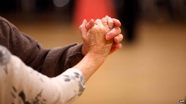 Elderly people dancing