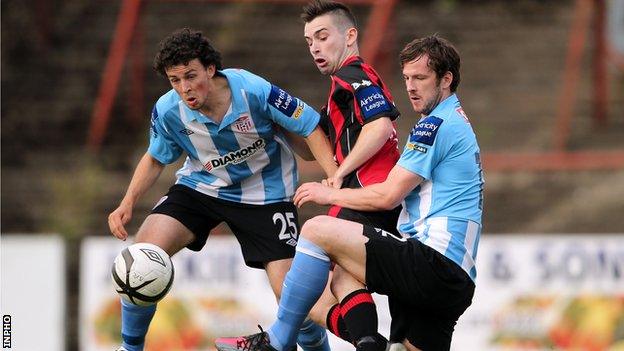 Bohemians' Karle Moore under pressure from Barry McNamee and Ryan McBride of Derry City