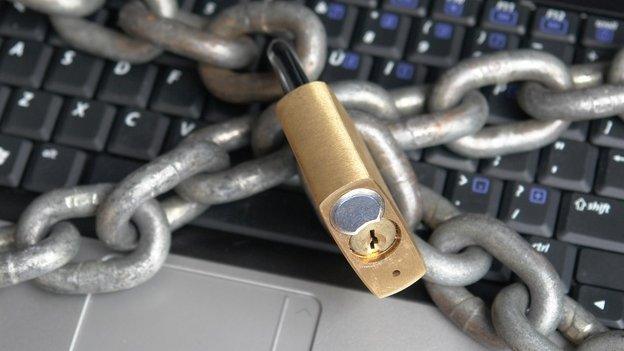 A keyboard secured with a padlock