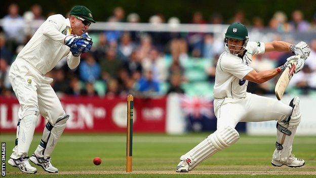 Nick Compton cuts as Brad Haddin looks on