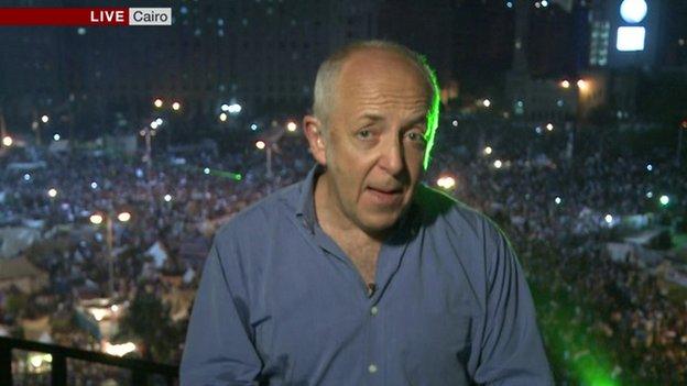 Jeremy Bowen picked out by laser pen in Tahrir Square