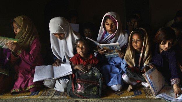 Makeshift school in a clay house on the outskirts of Islamabad, Pakistan