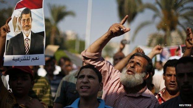 Supporters of deposed Egyptian President Mohammed Morsi protest in Cairo 6 July 2013