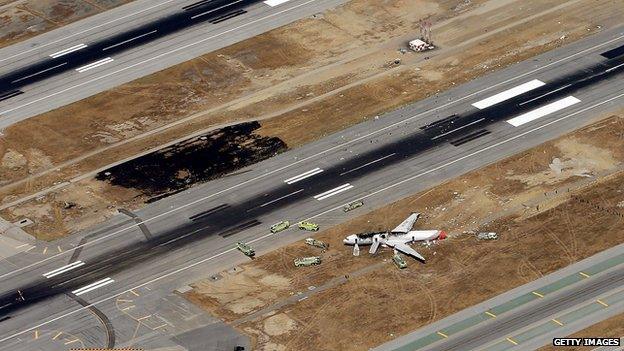 Wreckage of plane at San Francisco airport (7 July 2013)