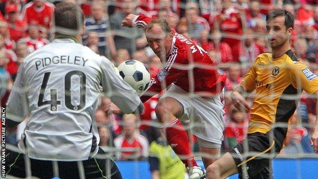 Andy Morrell takes a shot at goal in the Conference play-off final against Newport County