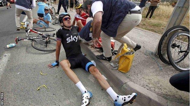 Geraint Thomas after crashing towards the end of the first stage of the Tour