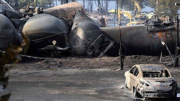 Destroyed oil containers are seen after the train derailment in Lac-Megantic, Canada, 7 July 2013